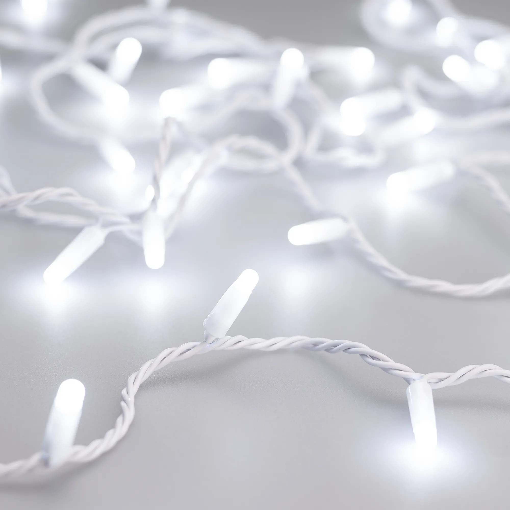 Светодиодная гирлянда ARD-STRING-CLASSIC-10000-WHITE-100LED-MILK-STD White (230V, 7W) (Ardecoled, IP65) - изображение товара